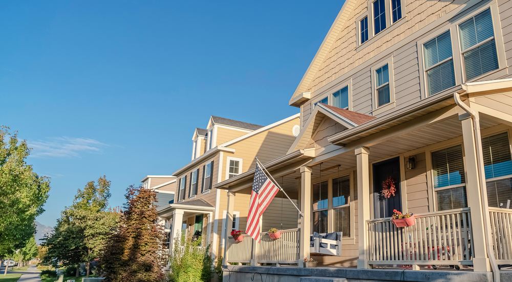 Stock photo of an American flag on a porch used in an illustrative fictional ad example
