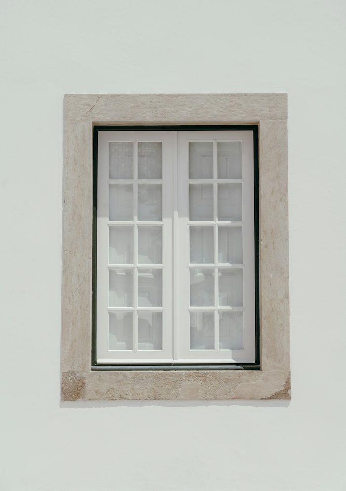 White window frame of the kind common in vinyl replacement windows